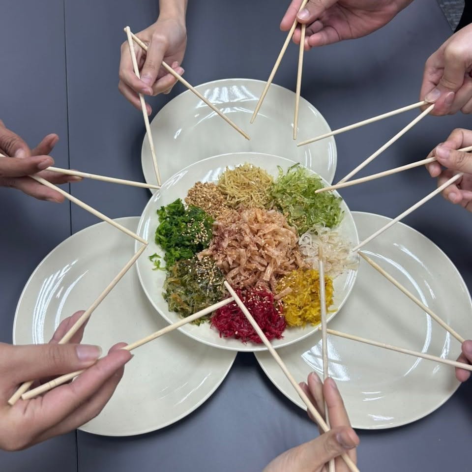 The OmniNexus team: Yee sang at CNY